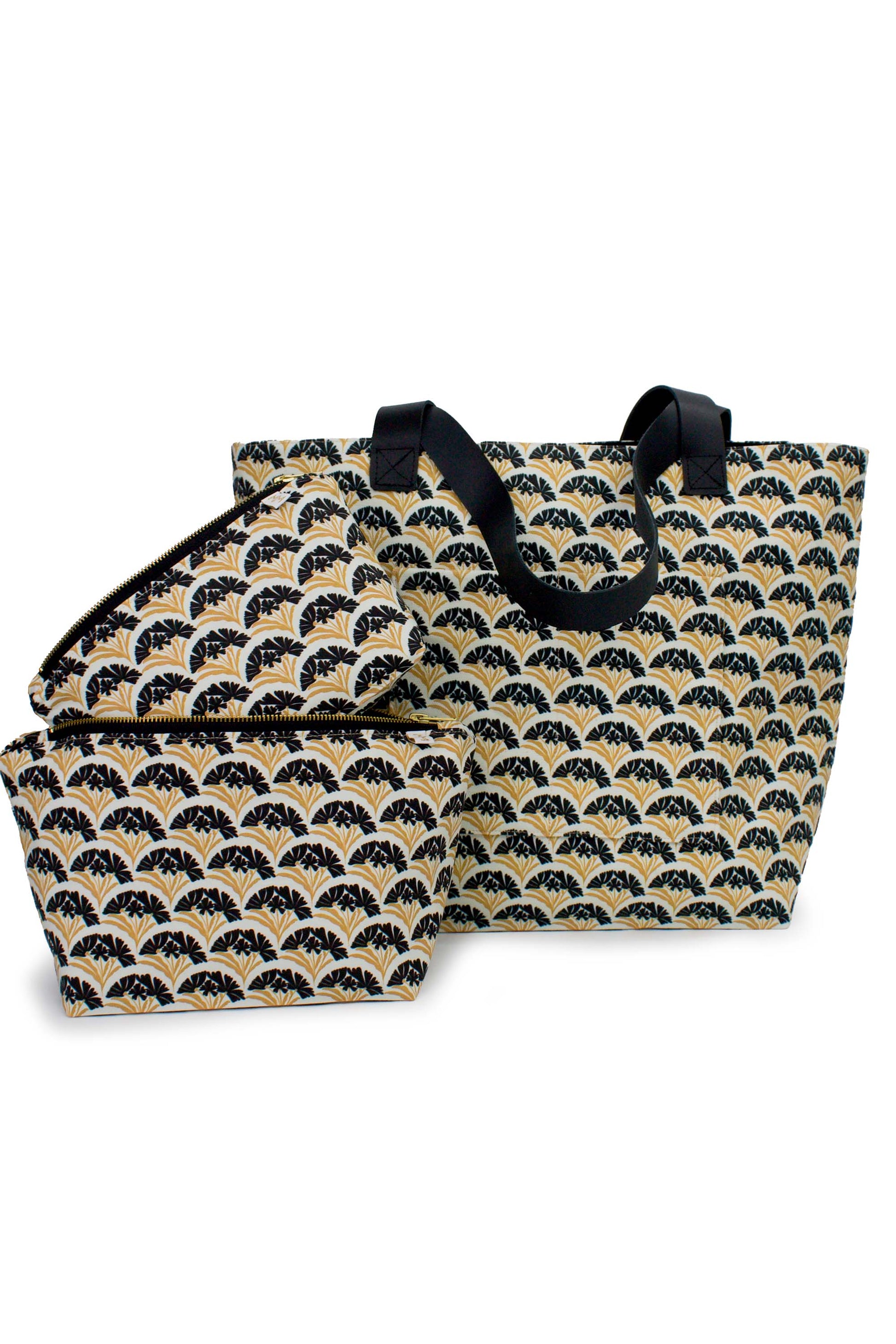 Coordinating Art Deco Scallop Classic Maxx, Mini Maxx and tote bags in a cream, black and gold floral pattern.