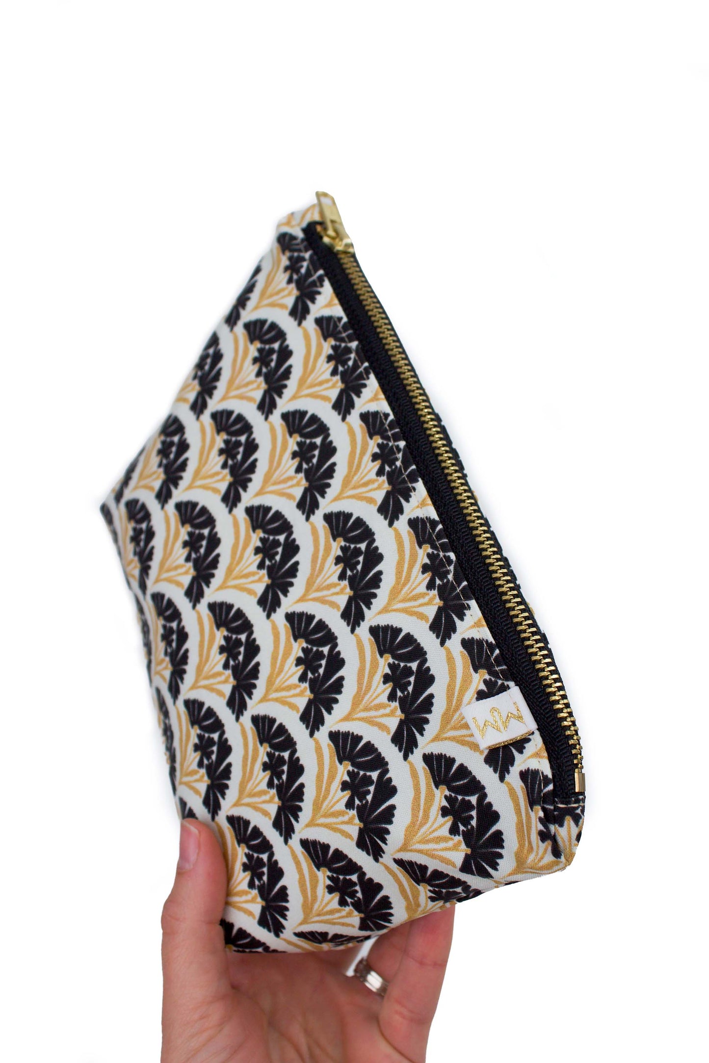 Side view of the Art Deco Scallop Classic Mini Maxx showing its roomy gusset, zipper and gold hardware.