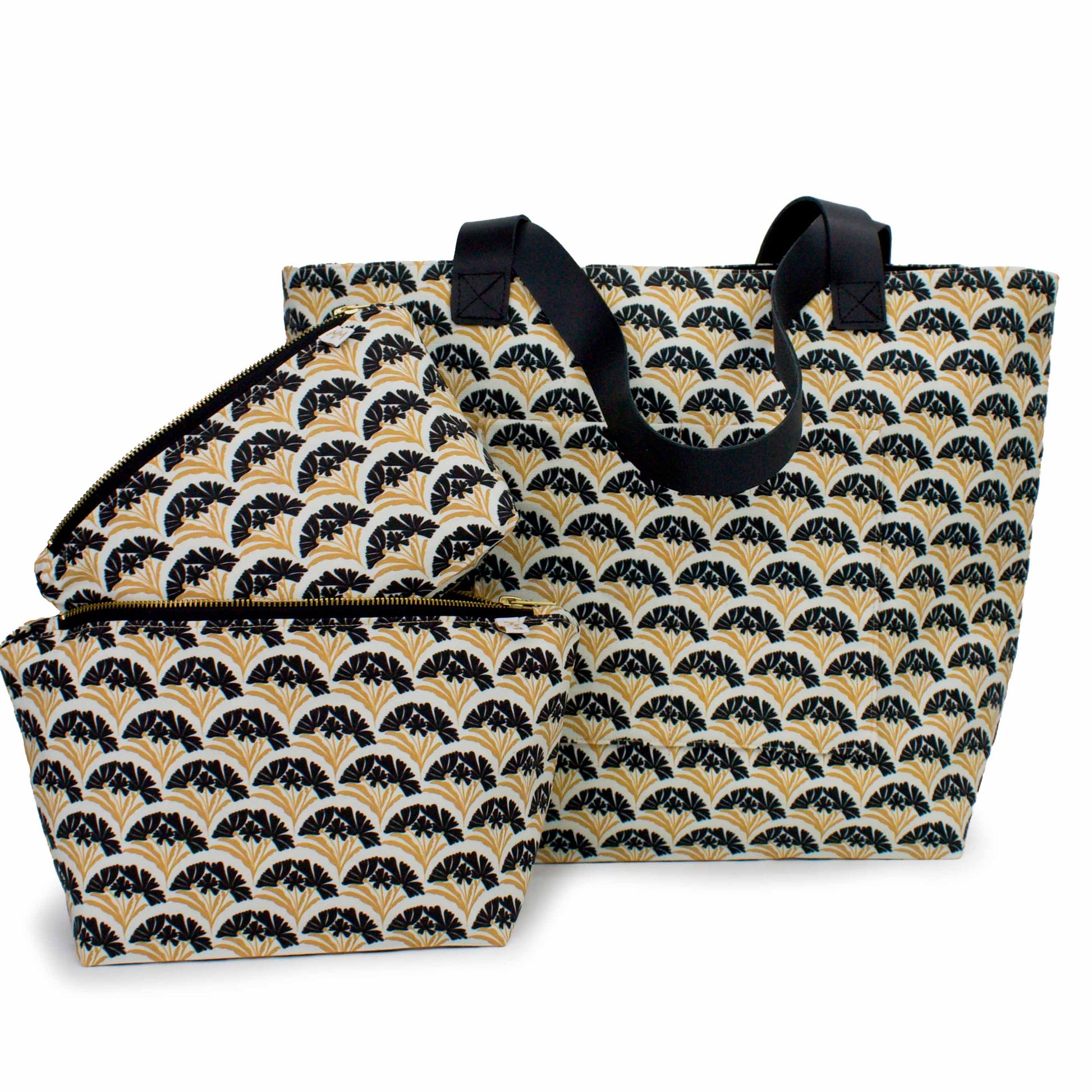 Coordinating Art Deco Scallop Classic tote, Mini Maxx and Maxx bags in a cream, black and gold floral pattern.