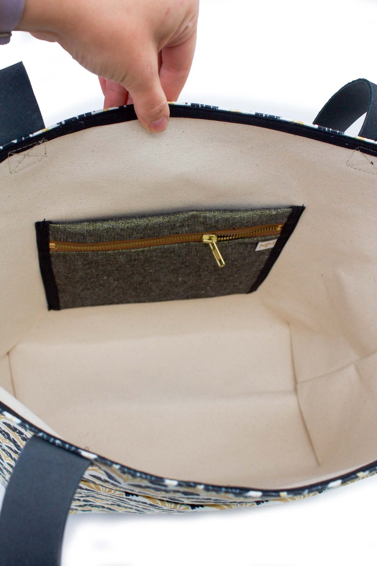 Open Art Deco Scallop Classic Everyday Tote showing its spacious wipeable interior and interior zippered pocket.